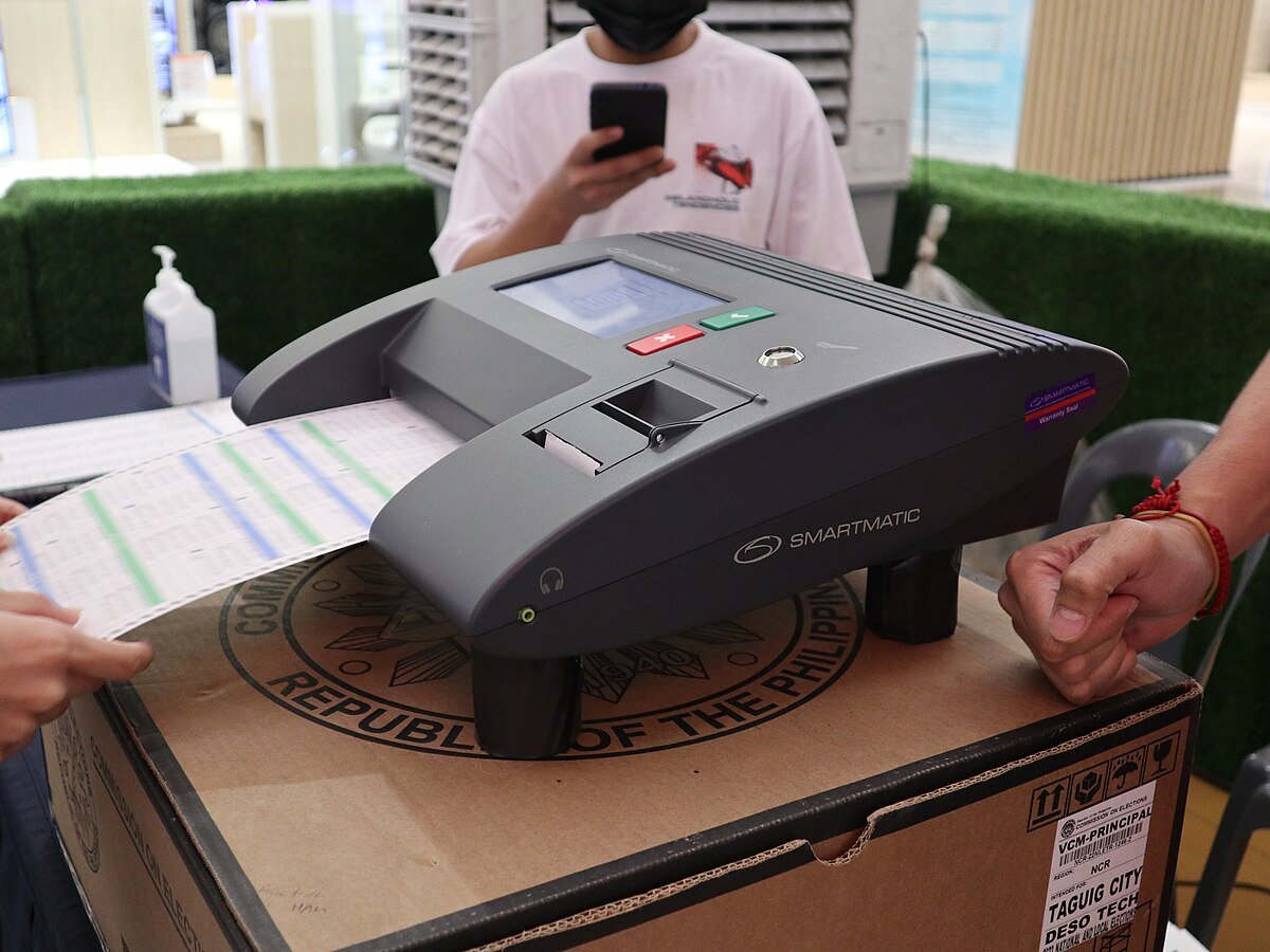Smartmatic vote-counting machine at a COMELEC demo exhibit in SM City Marikina, Philippines, April 2022